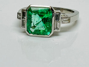 Vintage Style Emerald and Baguette Diamond Ring in Platinum