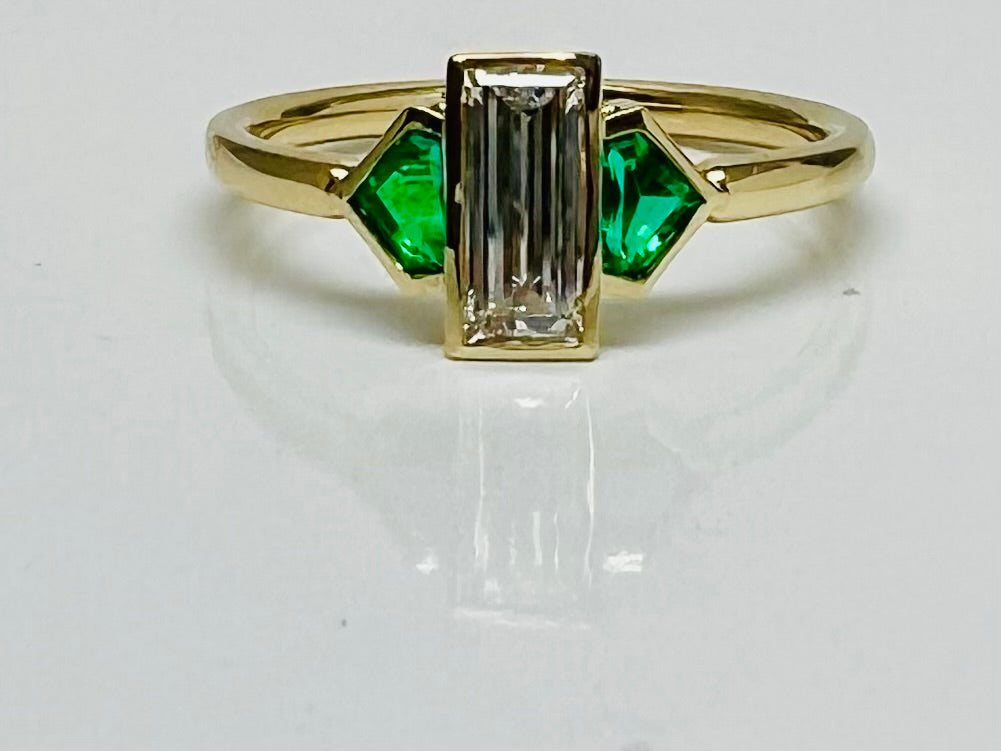 Baguette diamond and shield cut emerald ring in 14kyg