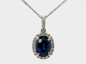 Vibrant Blue Oval Sapphire and Diamond Halo Pendant