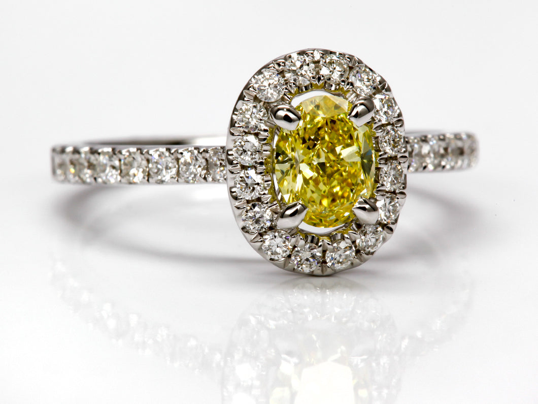 Fancy Vivid Yellow Oval Diamond Halo Ring
