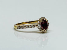 Load image into Gallery viewer, Vivid Ruby and Diamond Halo Ring in Yellow Gold

