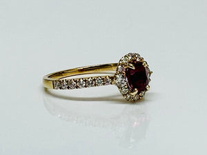 Vivid Ruby and Diamond Halo Ring in Yellow Gold