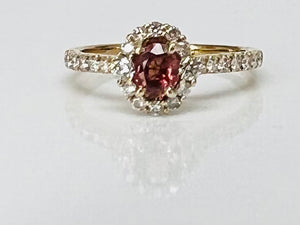 Padparadscha Sapphire and Diamond Ring in yellow gold